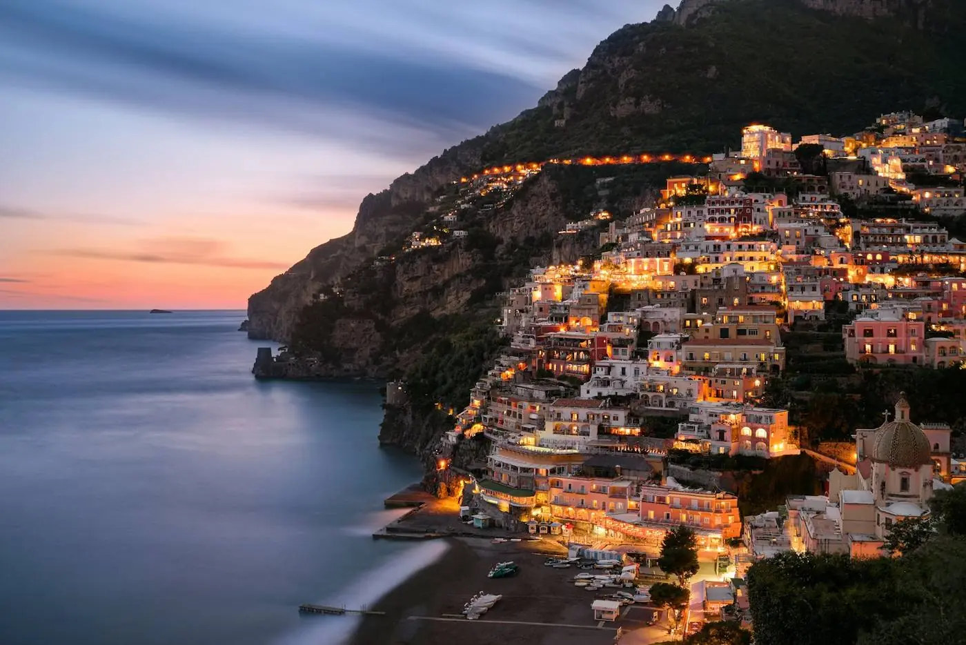 Positano seen from the sea, with its colourful houses on the hillside